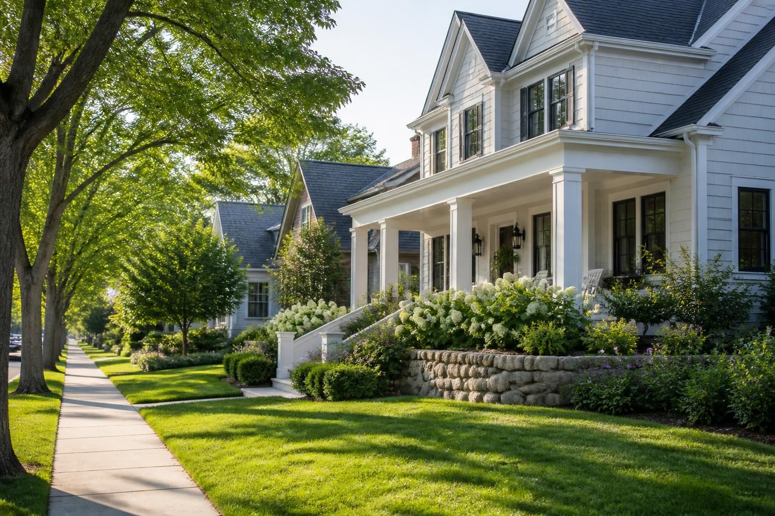 Refined neighborhood with mature street trees and bright homes.